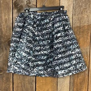 Above the knee skirt.